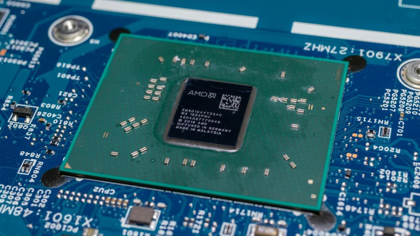 Close-up of a processor on a motherboard, representing custom AI inference silicon