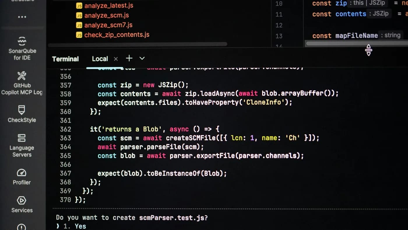 Dark photograph of code on a screen representing an open-weight coding model