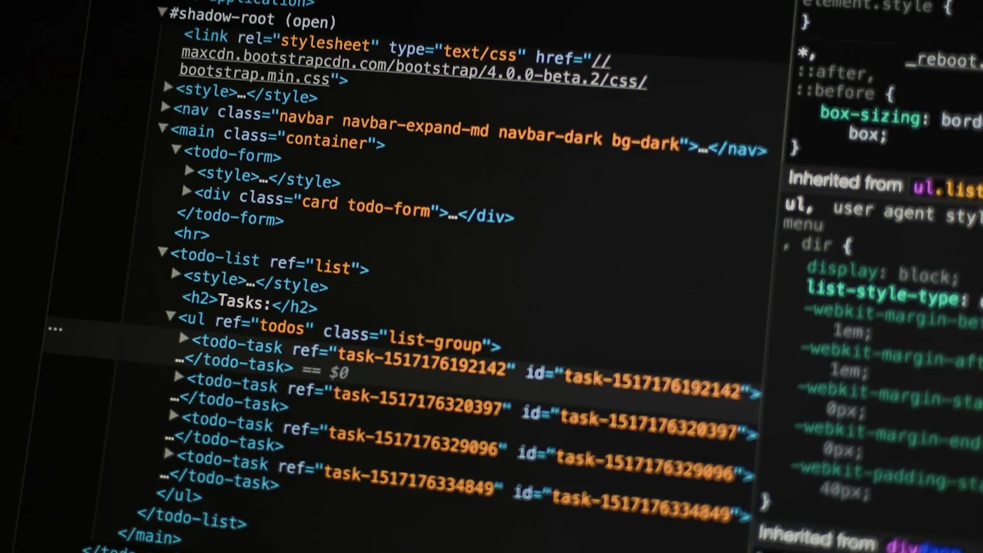 Dark browser DevTools showing HTML code structure, representing AI developer tools billing